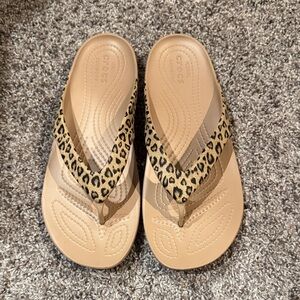 CROCS Women's Tan Leopard flip flops